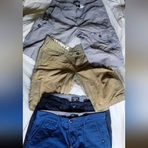 4 pairs of men's casual surfware shorts Quicksilver, Hurley, and Helix